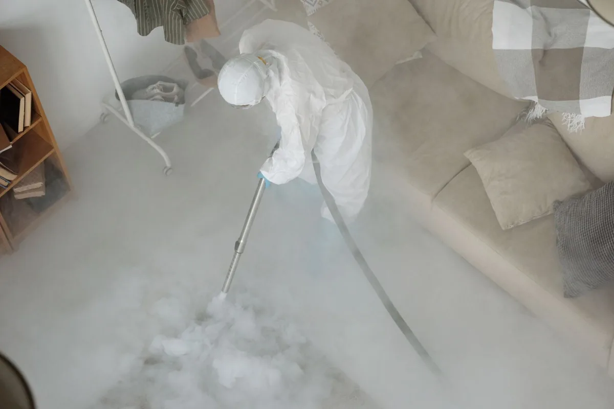 Biohazard cleanup technician in protective equipment, Raceland, LA